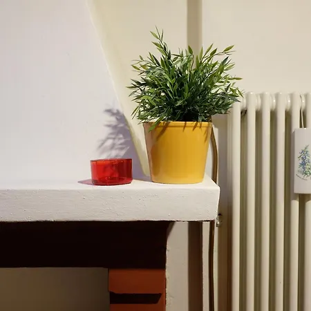 Guesthost - Castiglione Lovely Mansarda Apartmán